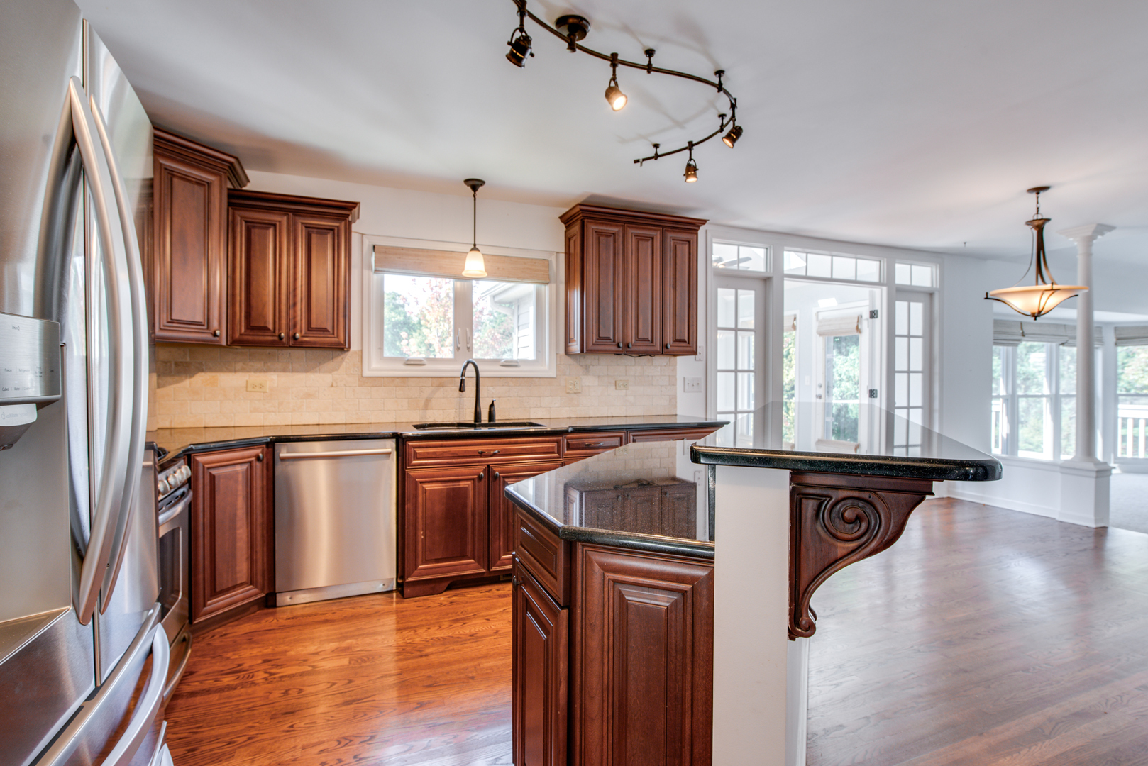 3631 Falkner Drive Naperville, IL 60564 - Photo 19 of 45 a kitchen with stainless steel appliances granite countertop a sink stove and refrigerator