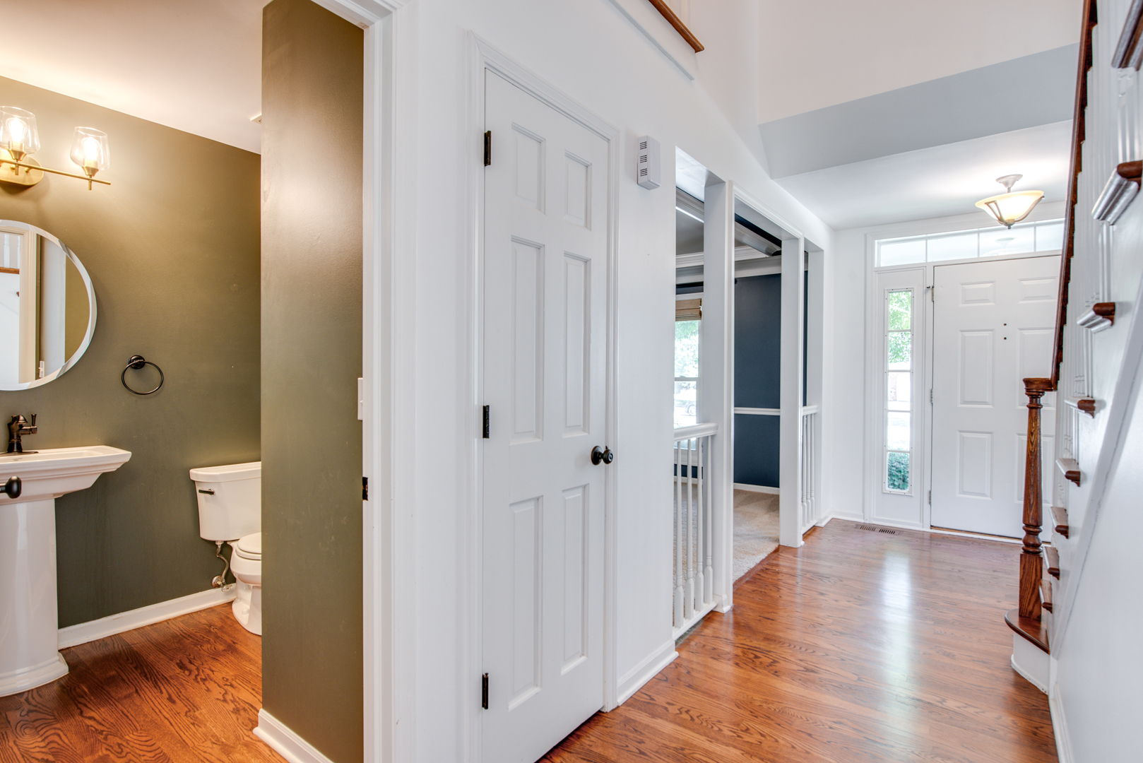 3631 Falkner Drive Naperville, IL 60564 - Photo 22 of 45 a view of a hallway with wooden floor and a bathroom