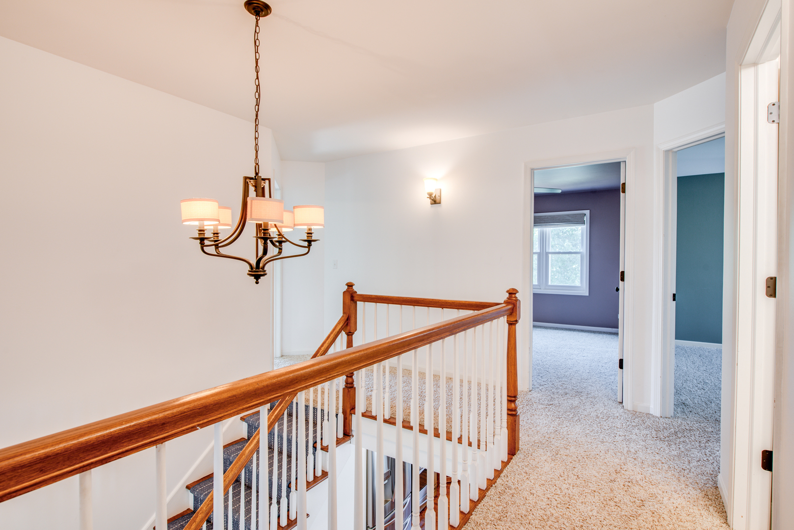 3631 Falkner Drive Naperville, IL 60564 - Photo 24 of 45 a view of a hallway with a chandelier