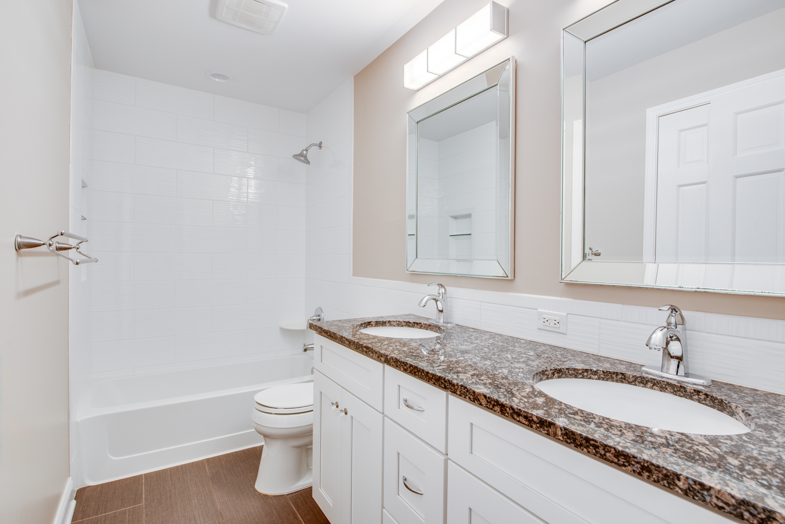 3631 Falkner Drive Naperville, IL 60564 - Photo 27 of 45 a bathroom with a granite countertop sink a toilet and a bathtub