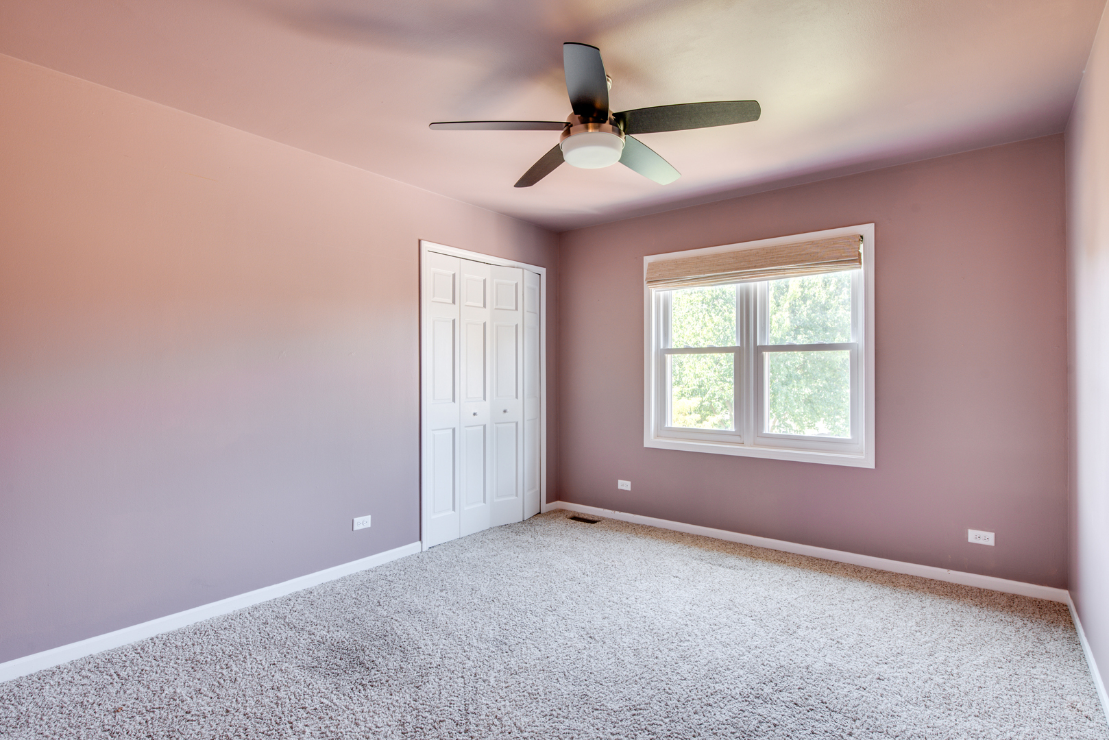 3631 Falkner Drive Naperville, IL 60564 - Photo 29 of 45 an empty room with a ceiling fan and windows