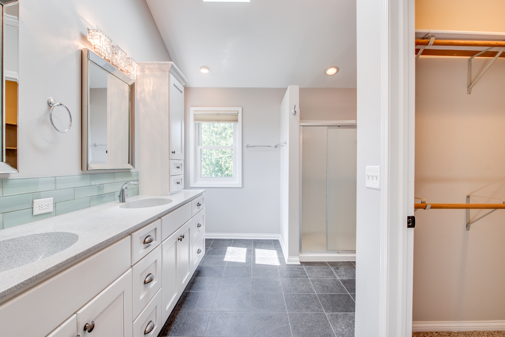 3631 Falkner Drive Naperville, IL 60564 - Photo 33 of 45 a bathroom with a double vanity sink and a mirror