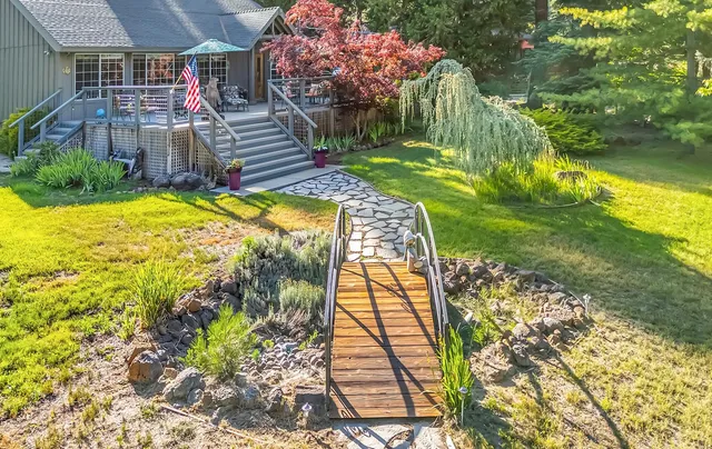 a view of swimming pool from a garden