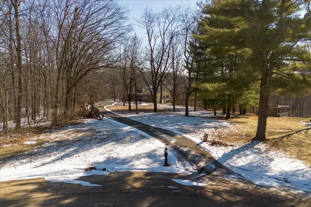 a view of a backyard of the house