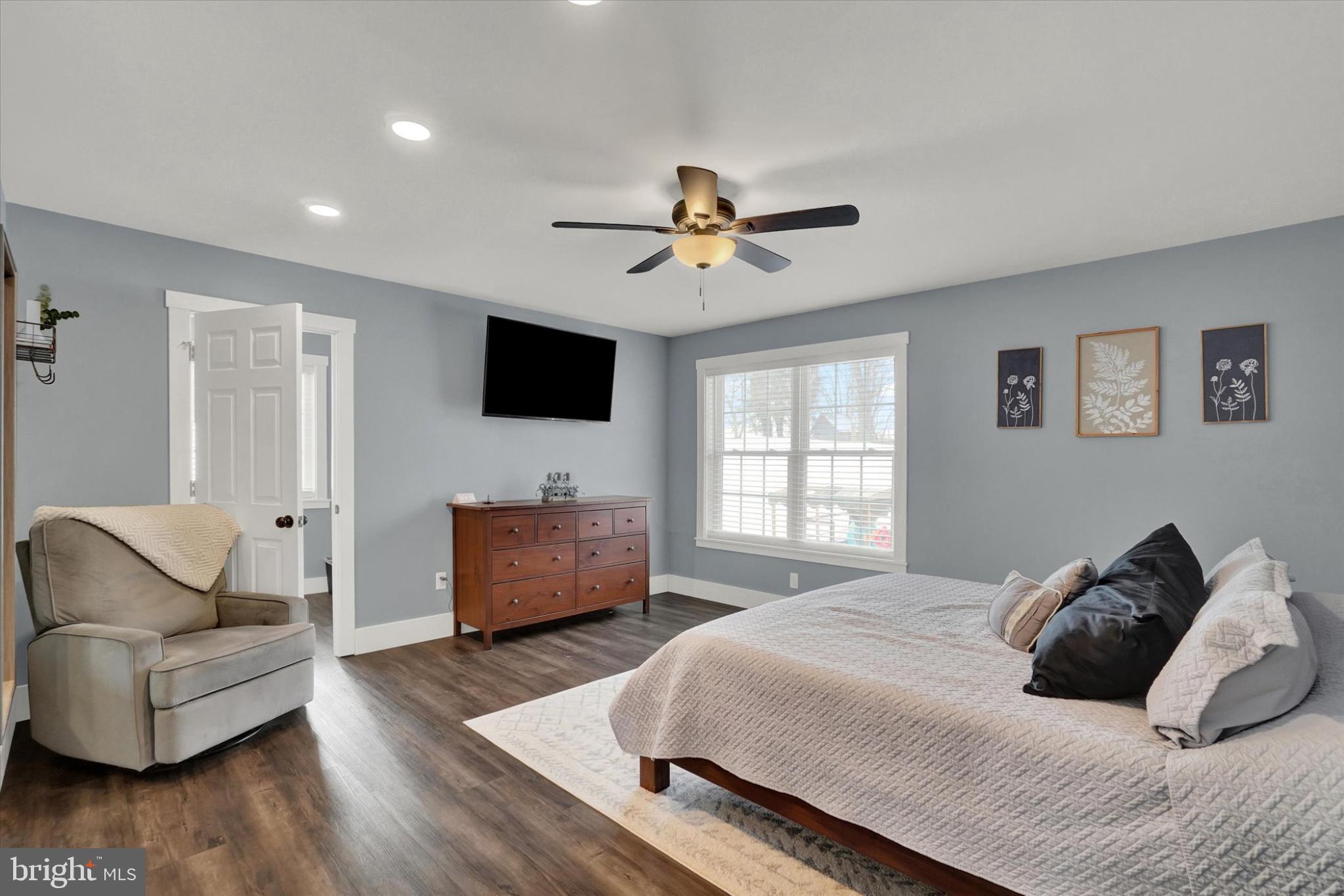 1048 Keller Road York, PA 17406 - Photo 14 of 28 a bedroom with a bed couch and window
