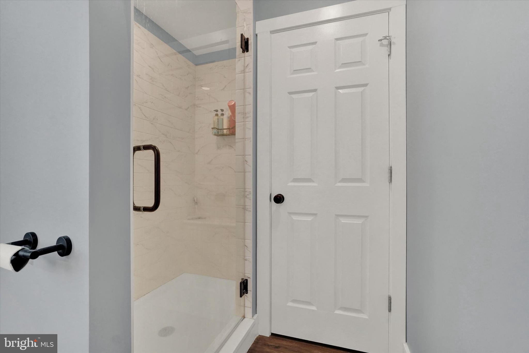 1048 Keller Road York, PA 17406 - Photo 21 of 28 a bathroom with a glass shower door