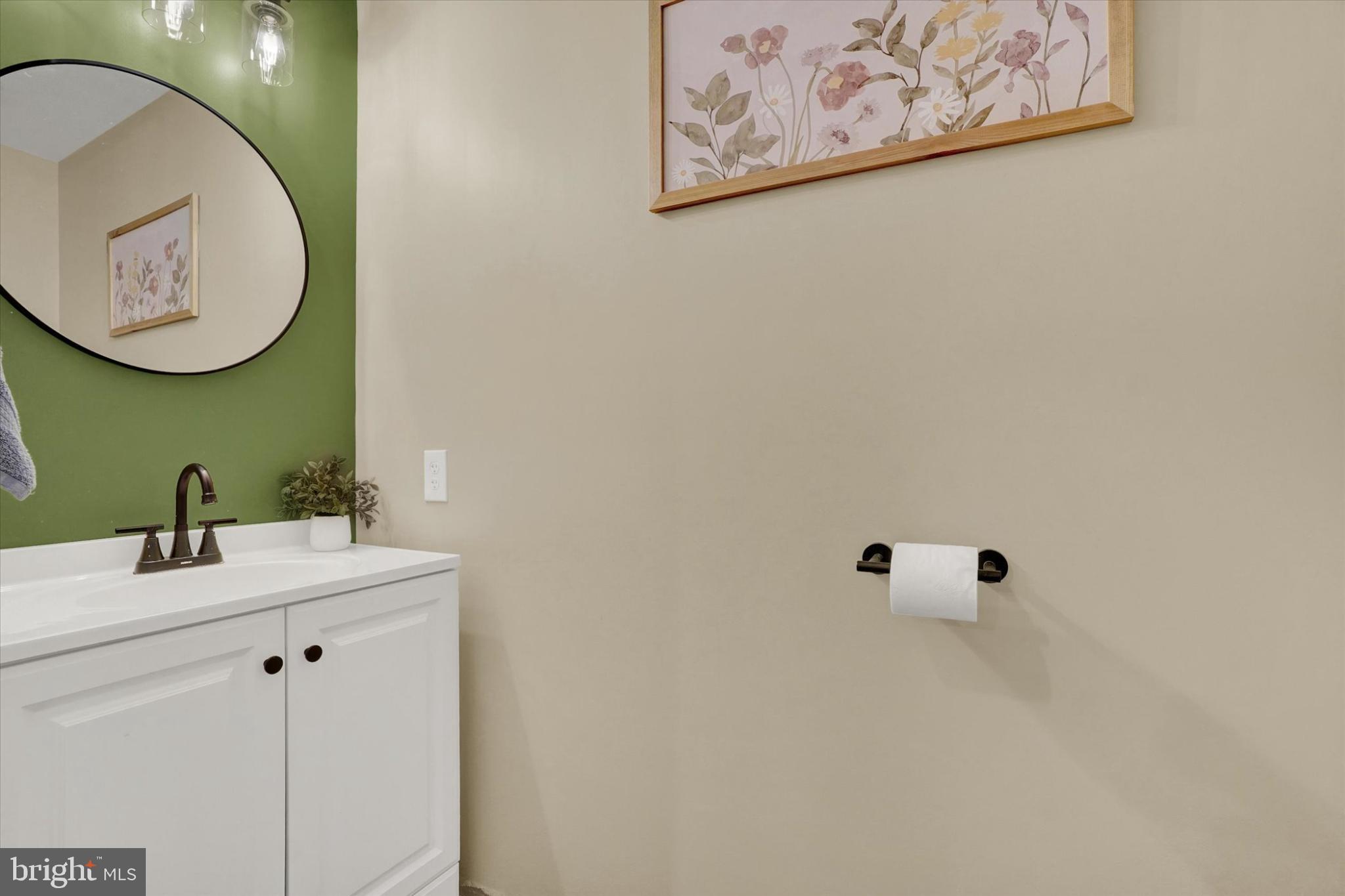1048 Keller Road York, PA 17406 - Photo 23 of 28 a bathroom with a toilet and a sink