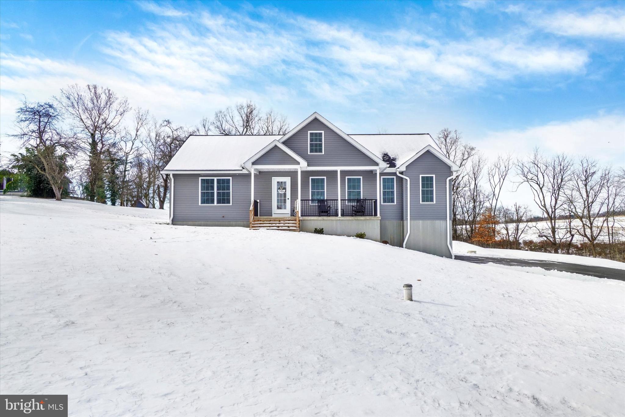 1048 Keller Road York, PA 17406 - Photo 3 of 28 a front view of a house with a yard
