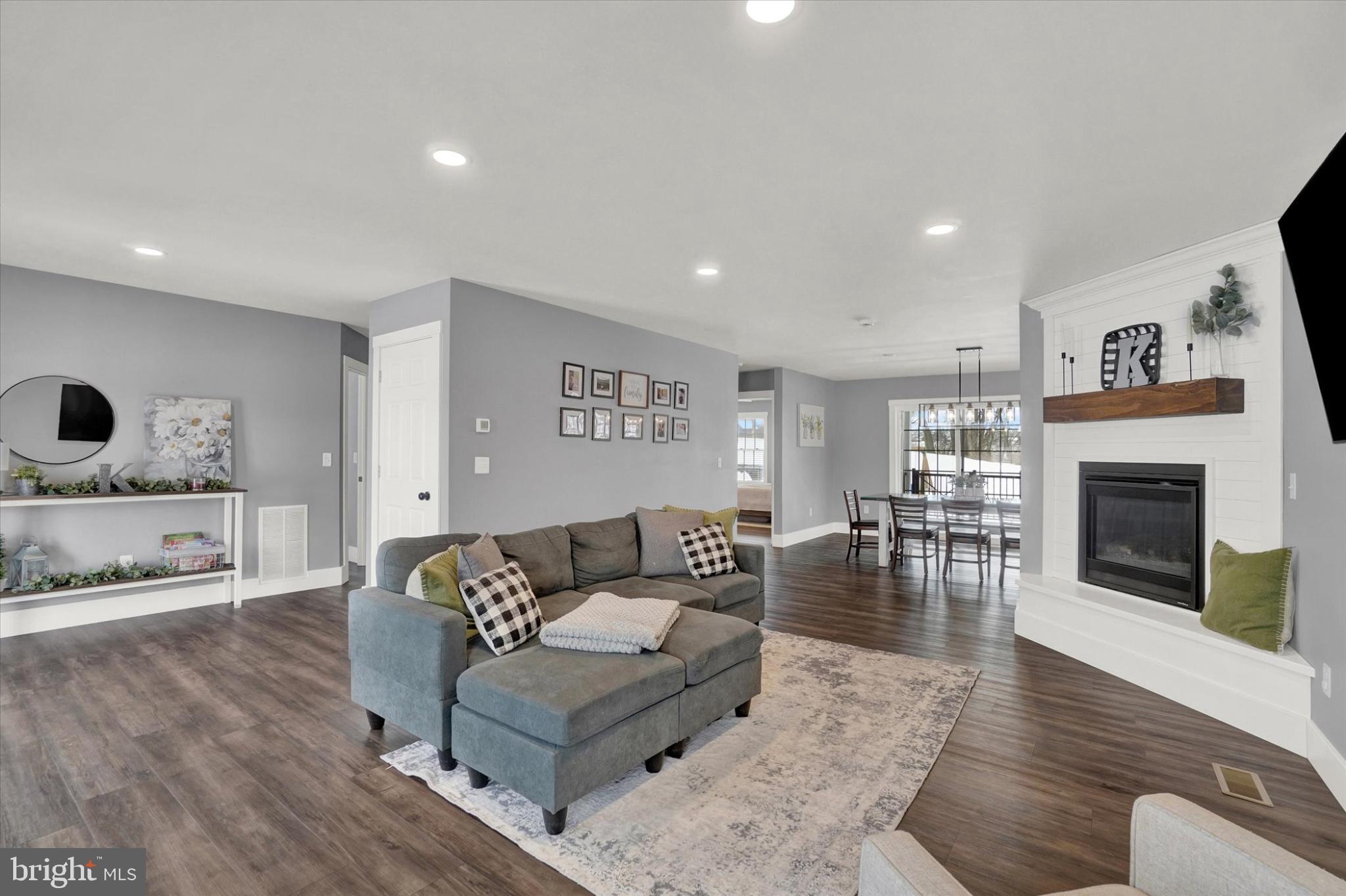 1048 Keller Road York, PA 17406 - Photo 5 of 28 a living room with furniture and a fireplace