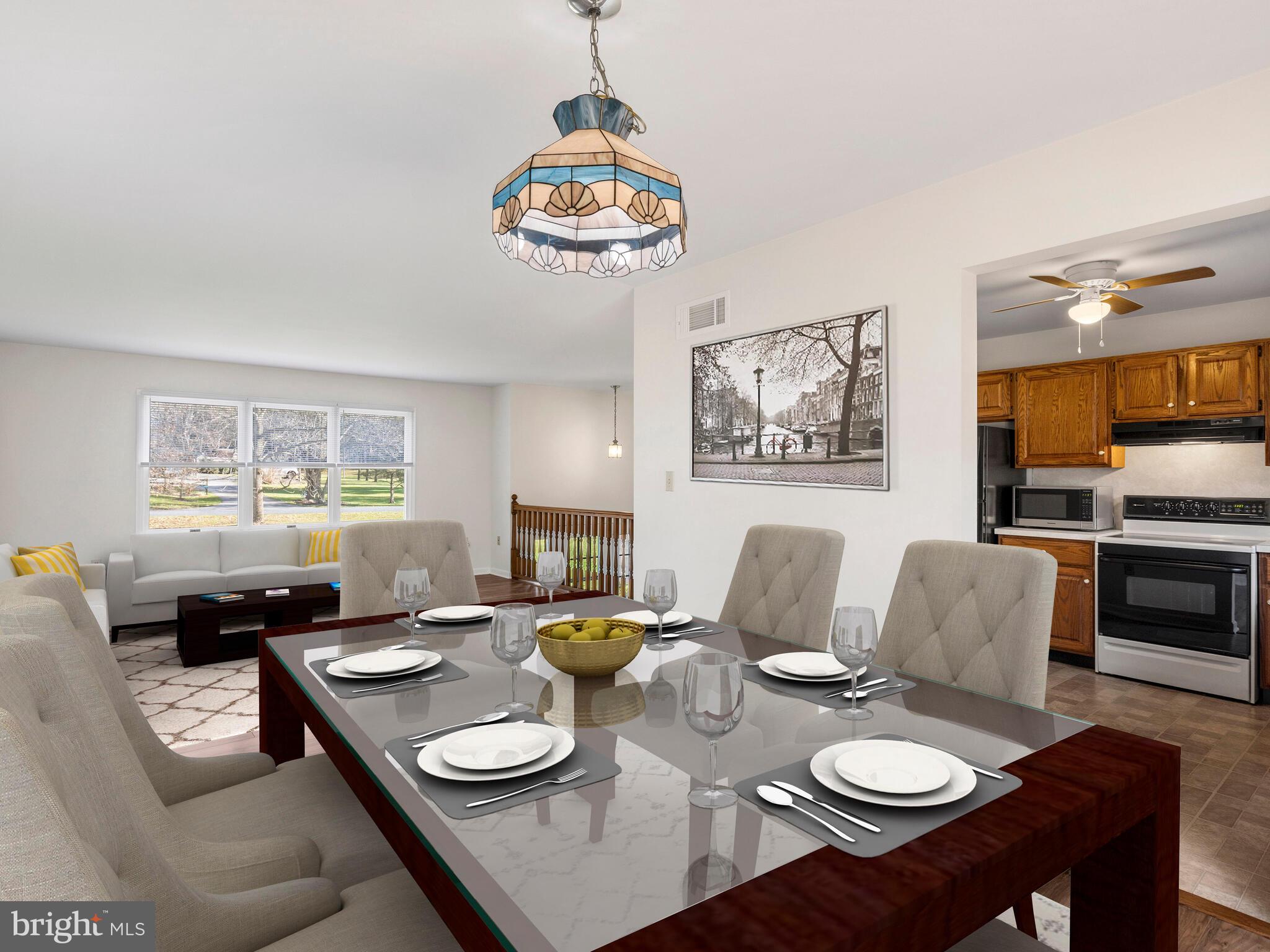 412 Saylors Mill Road Spring City, PA 19475 - Photo 10 of 55 Virtually staged dining room w/view of kitchen