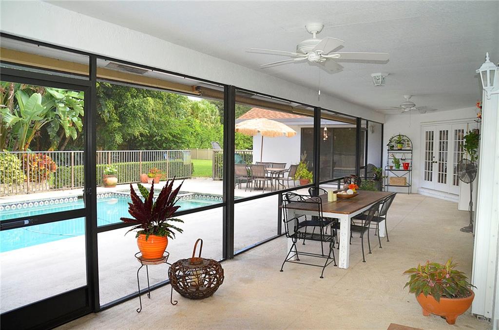 6476 Wood Lake Road Jupiter, FL 33458 - Photo 13 of 32 Covered Back Patio