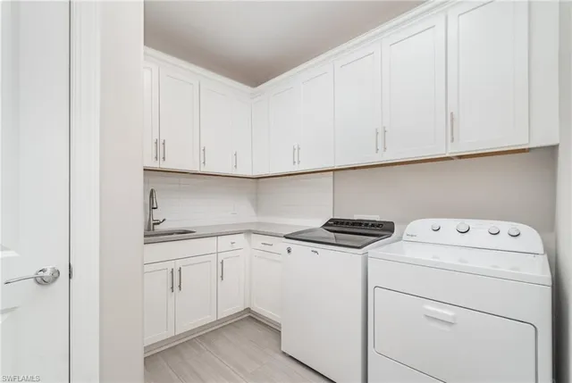 a kitchen with a sink a mirror and vanity