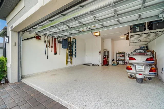 a view of cabinets with washer and dryer