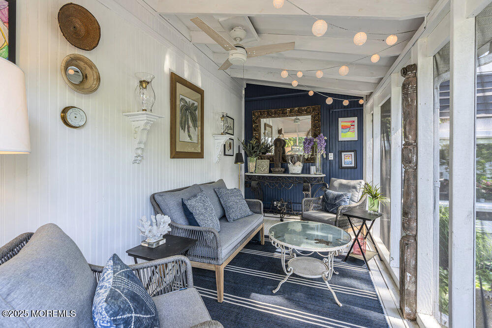 638 South Riverside Drive Neptune Township, NJ 07753 - Photo 11 of 41 a living room with furniture and a rug