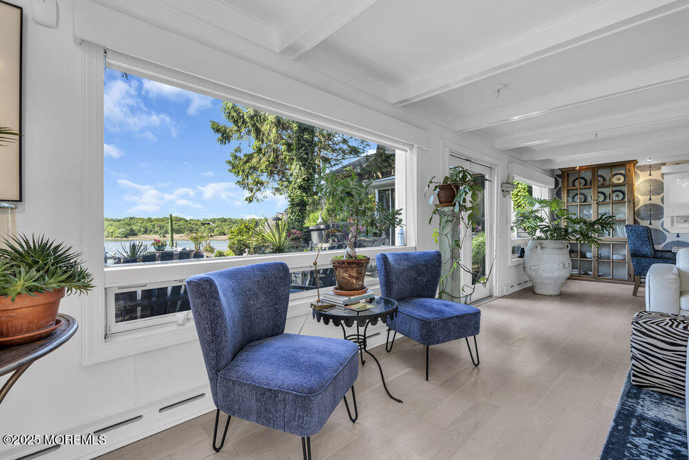 638 South Riverside Drive Neptune Township, NJ 07753 - Photo 15 of 41 a outdoor living space with furniture and garden view