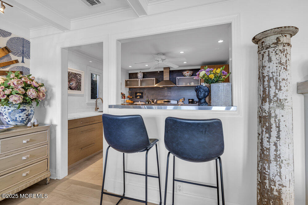 638 South Riverside Drive Neptune Township, NJ 07753 - Photo 21 of 41 a kitchen with stainless steel appliances granite countertop a refrigerator and a stove top oven