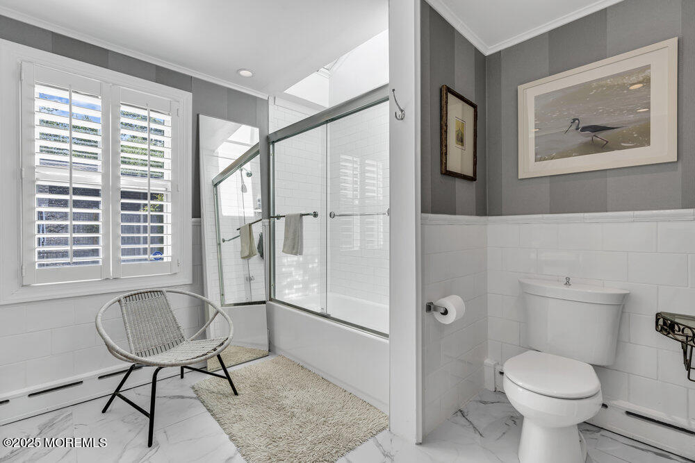 638 South Riverside Drive Neptune Township, NJ 07753 - Photo 30 of 41 a bathroom with a toilet and a shower