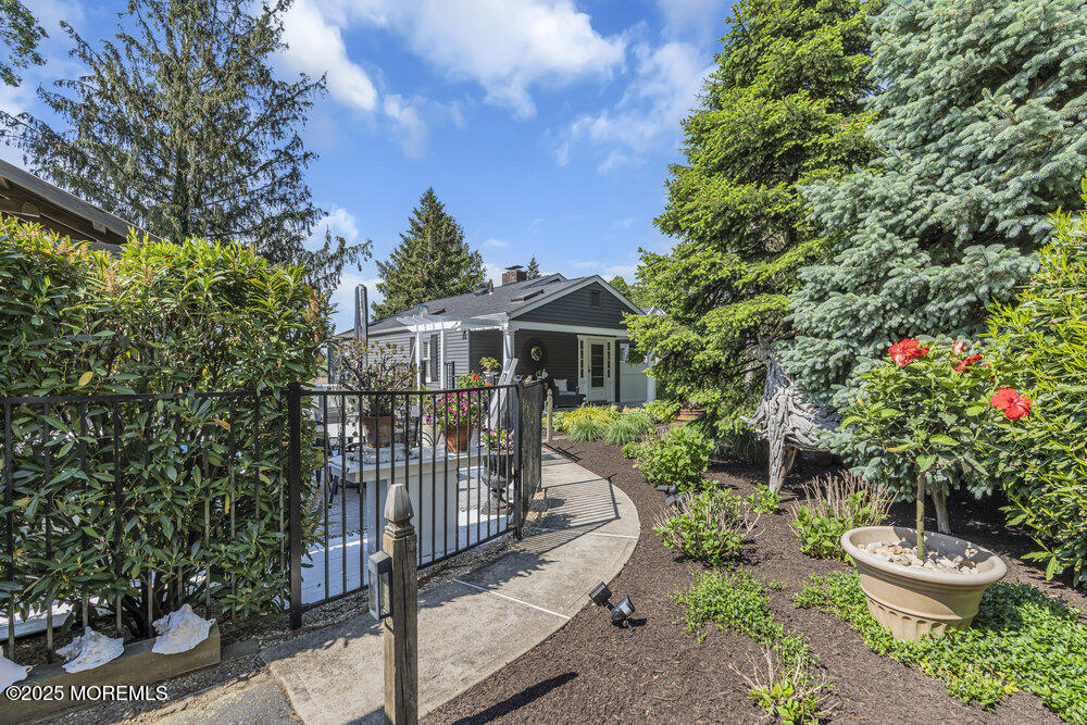 638 South Riverside Drive Neptune Township, NJ 07753 - Photo 39 of 41 a view of a chair and table in backyard