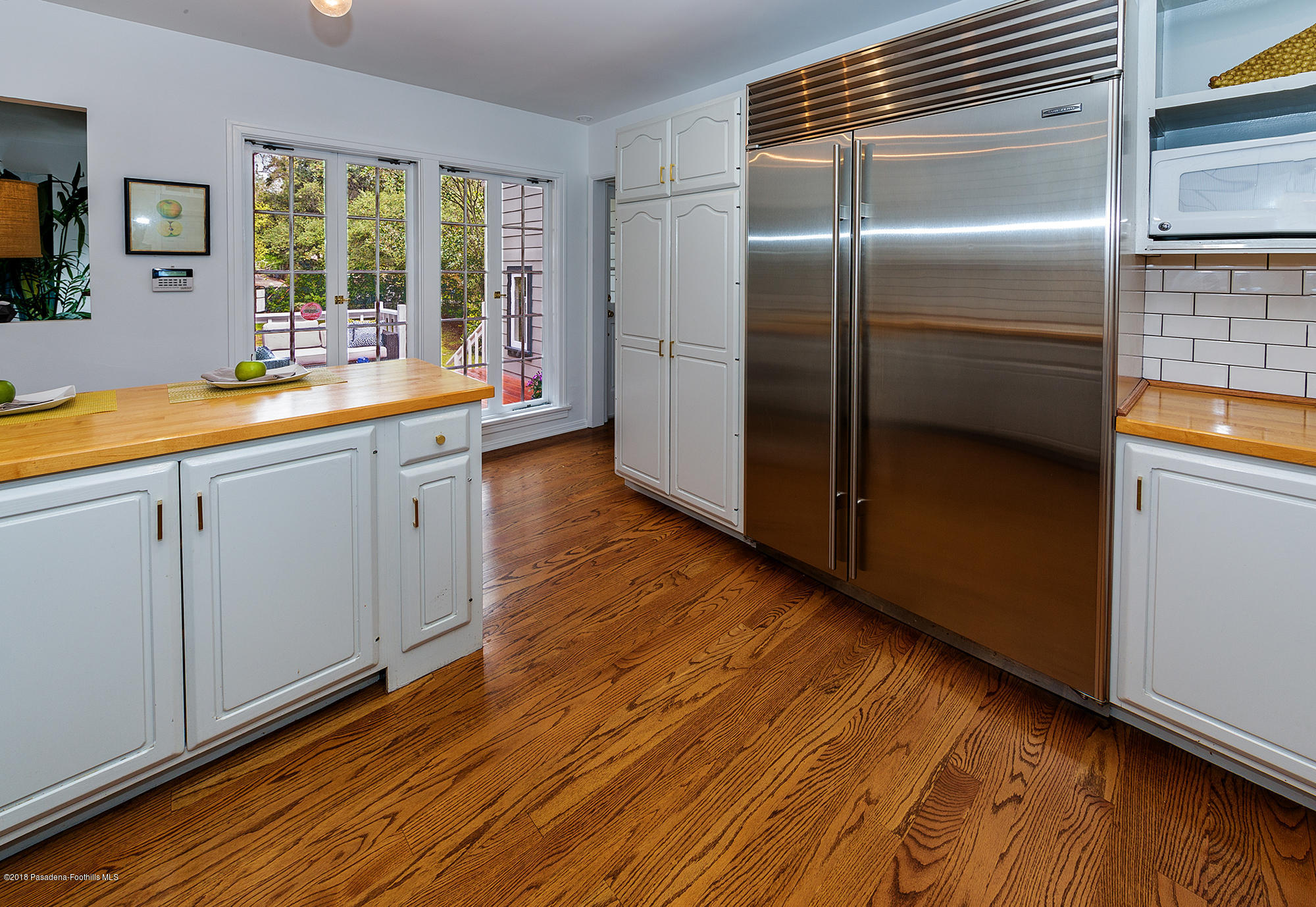 1280 Afton Street Pasadena, CA 91103 - Photo 14 of 39 a kitchen with stainless steel appliances granite countertop a refrigerator and a sink