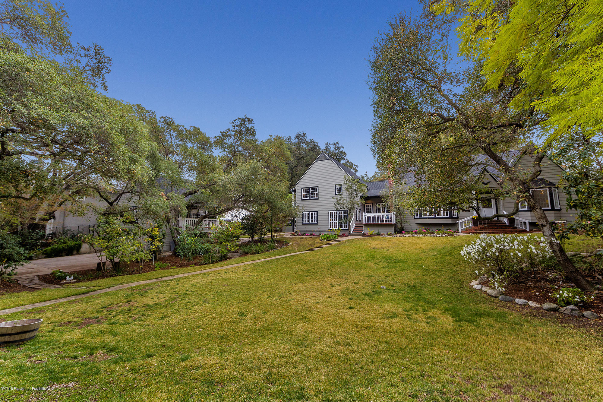 1280 Afton Street Pasadena, CA 91103 - Photo 30 of 39 a front view of a house with garden