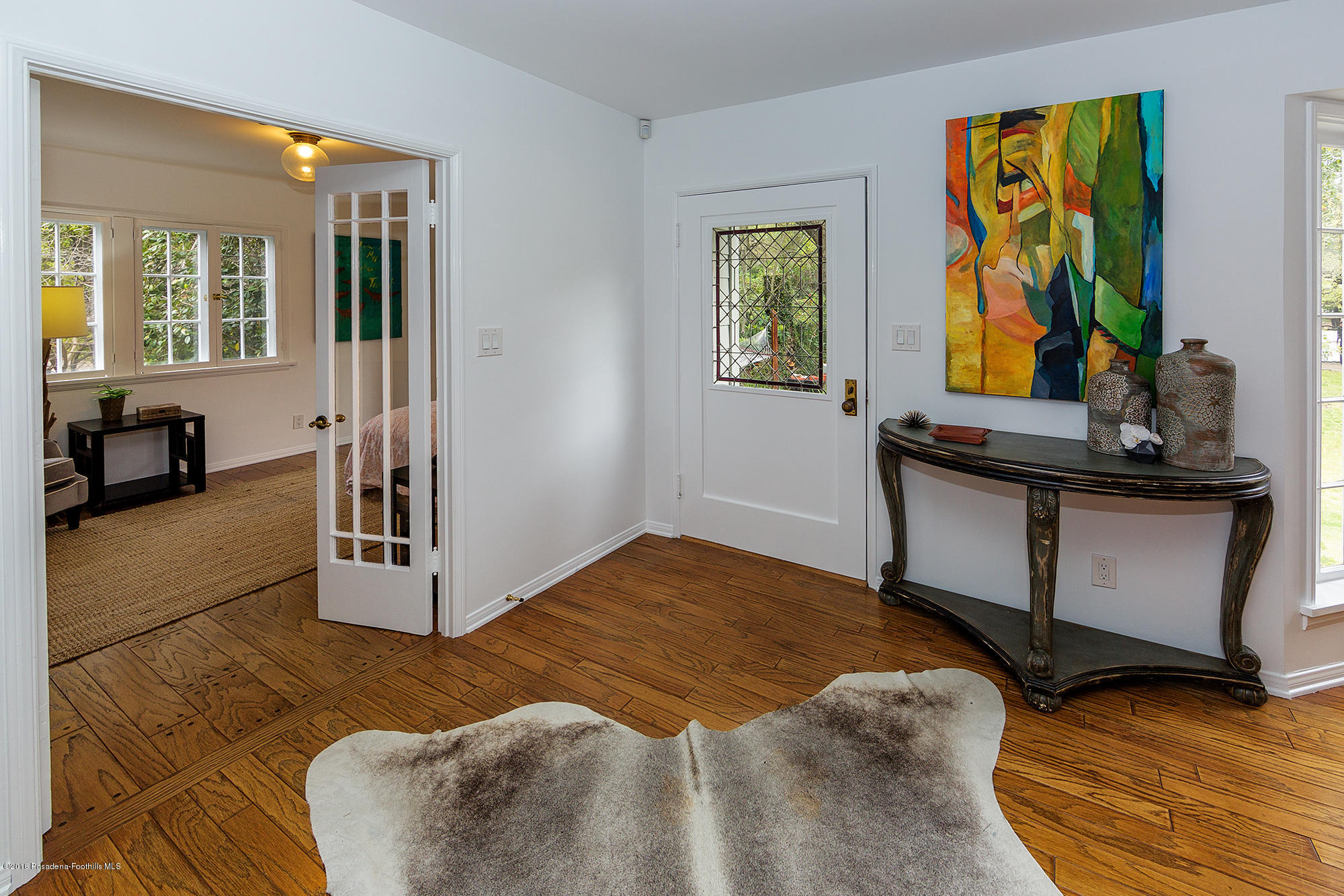 1280 Afton Street Pasadena, CA 91103 - Photo 4 of 39 a bedroom with a bed and a window