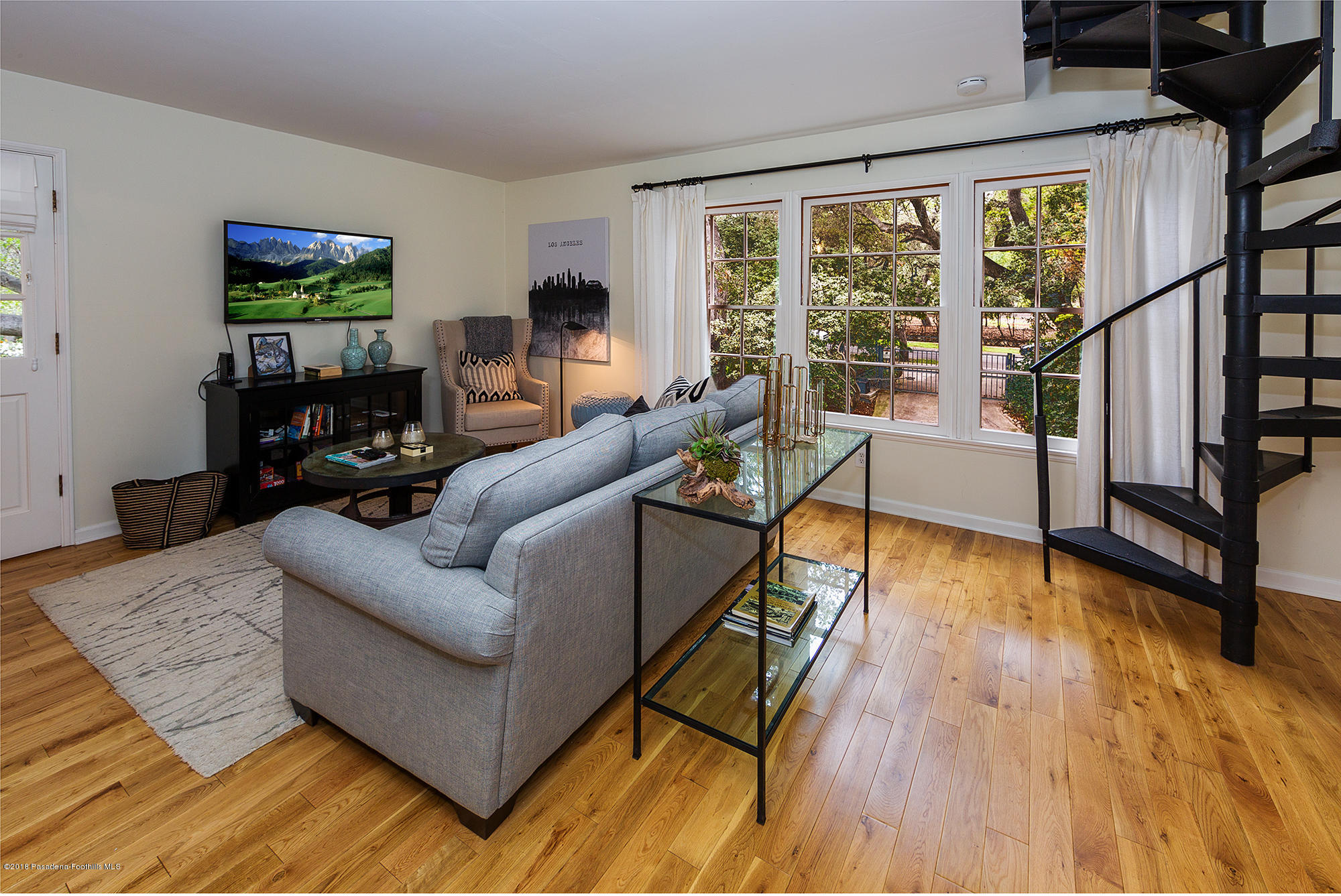 1280 Afton Street Pasadena, CA 91103 - Photo 34 of 39 a living room with furniture and a wooden floor