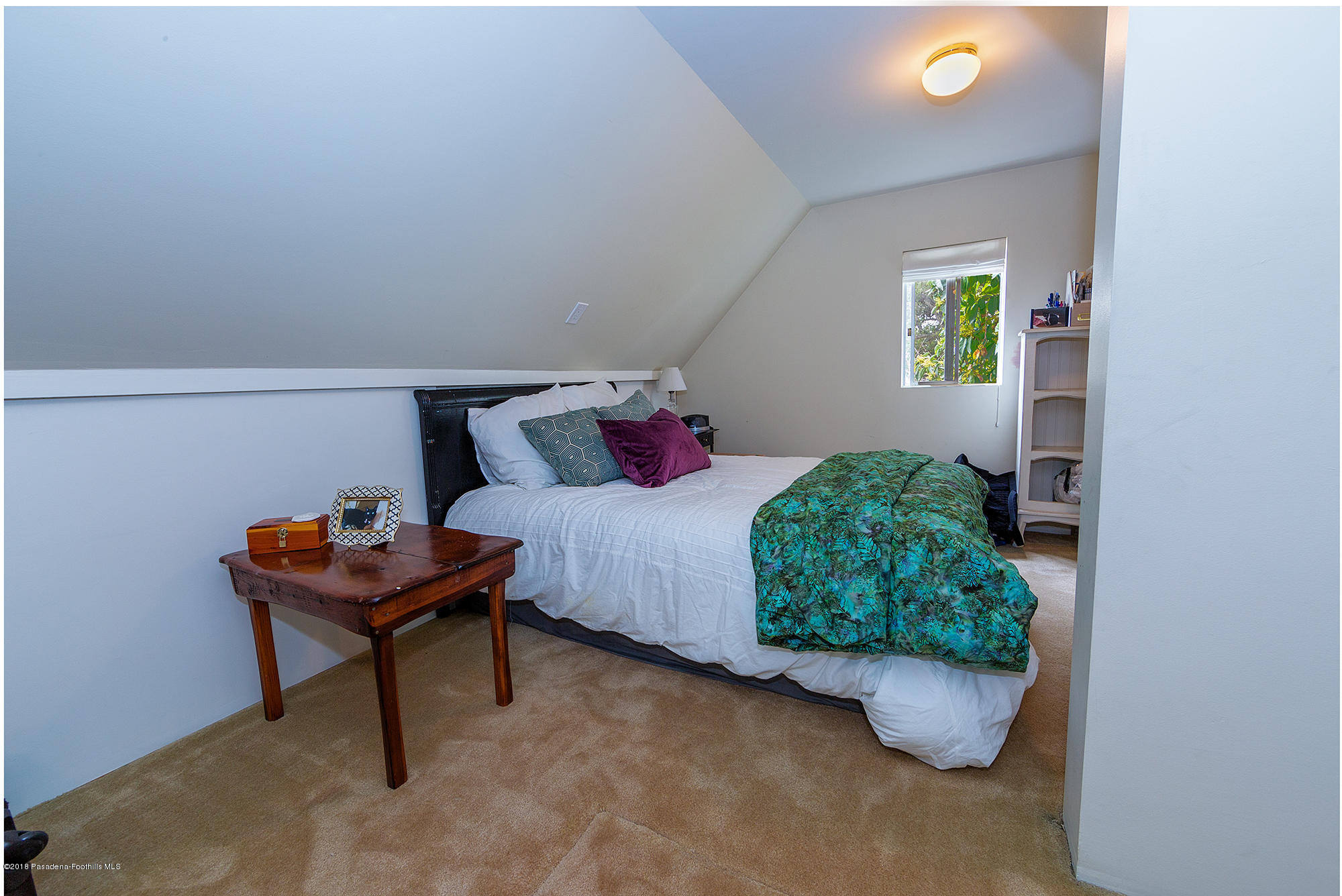 1280 Afton Street Pasadena, CA 91103 - Photo 36 of 39 a bedroom with a bed and a potted plant