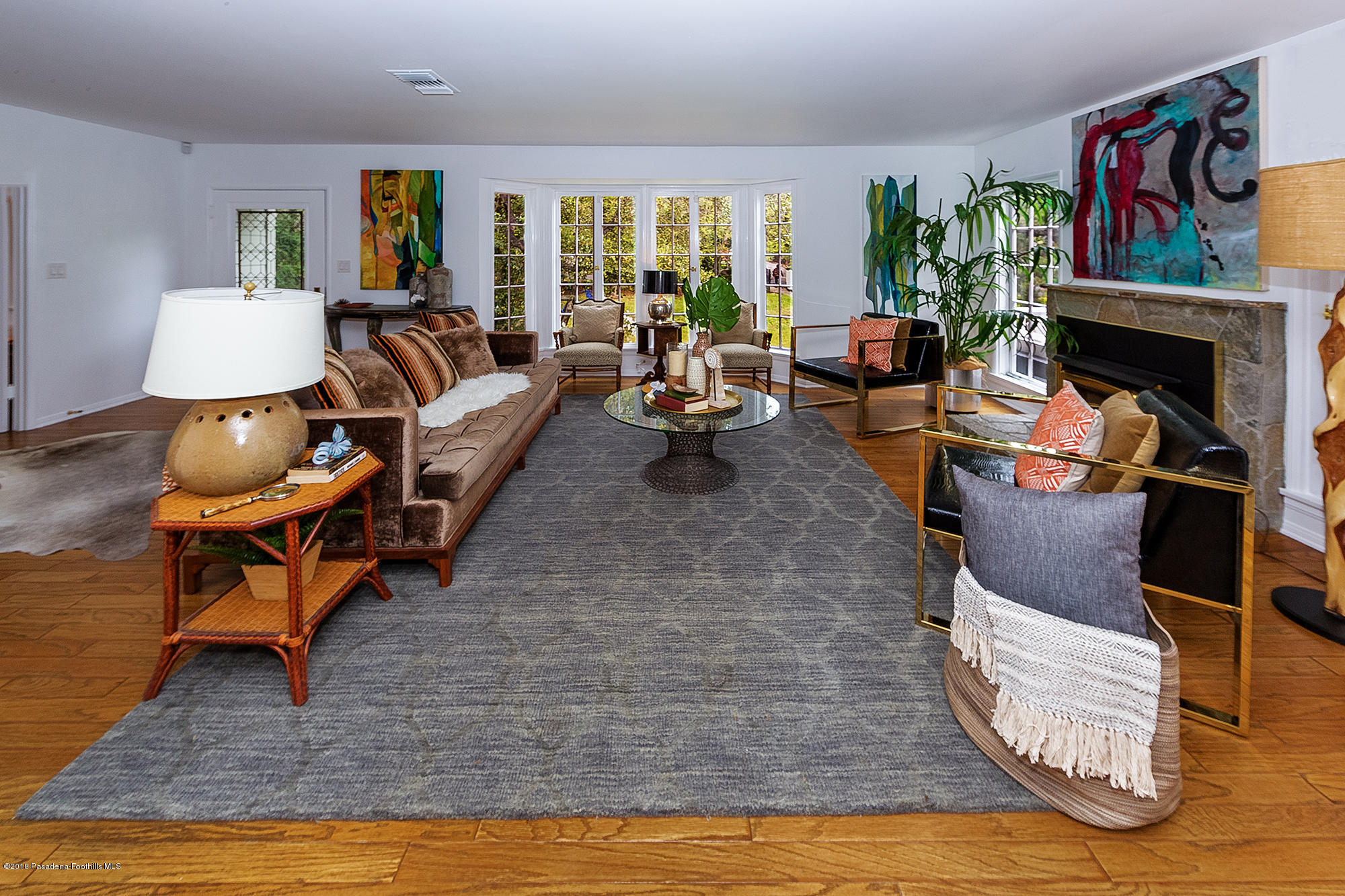 1280 Afton Street Pasadena, CA 91103 - Photo 6 of 39 a living room with furniture and a fireplace