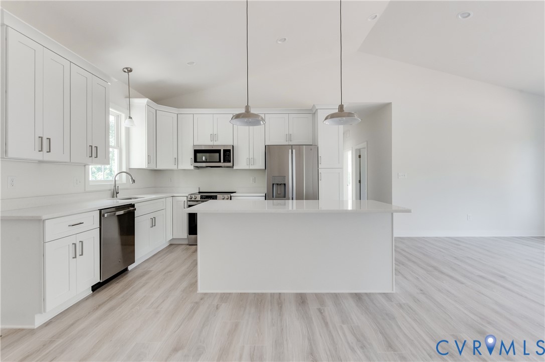 1393 Broad St Road Oilville, VA 23129 - Photo 6 of 39 Kitchen with vaulted ceiling, appliances with stai