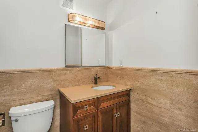 a bathroom with a sink and a toilet