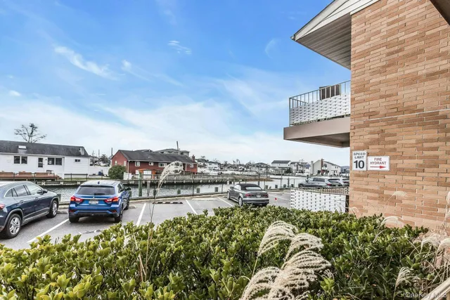 a view of a city street with cars