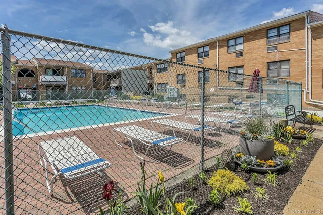 a view of a porch with seating space