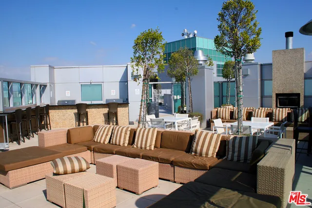 a view of a living room and a large window