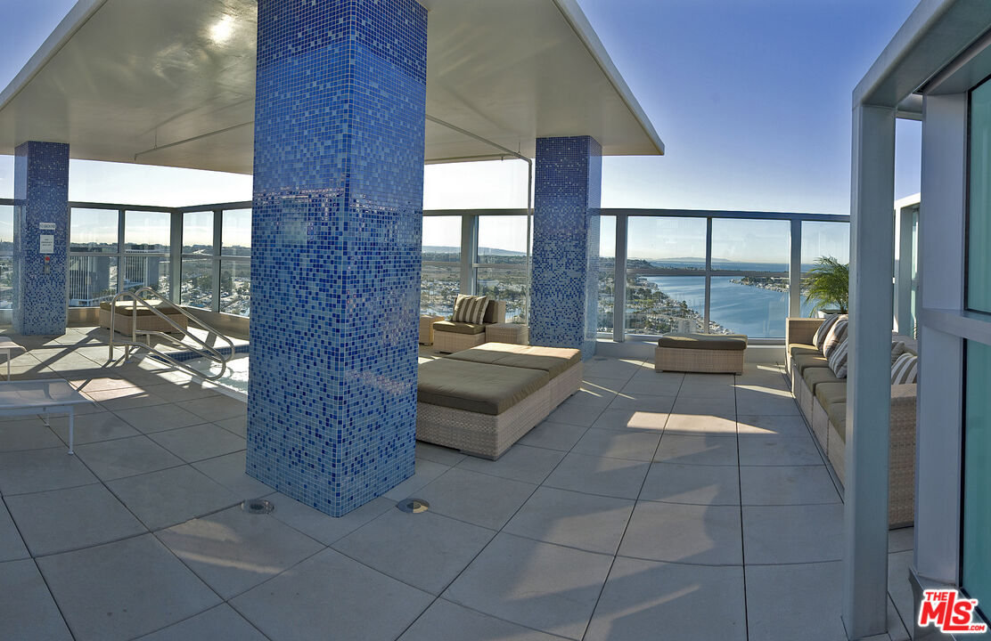 13700 Marina Pointe Drive, Unit 722 Marina del Rey, CA 90292 - Photo 50 of 52 a lobby with furniture and floor to ceiling window