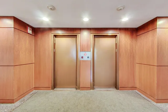 an empty room with closet area