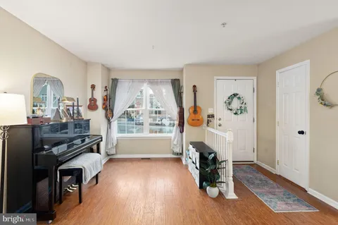 a view of a livingroom with furniture and a fireplace