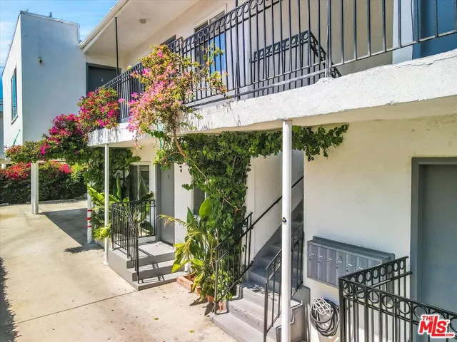 a front view of a house with yard