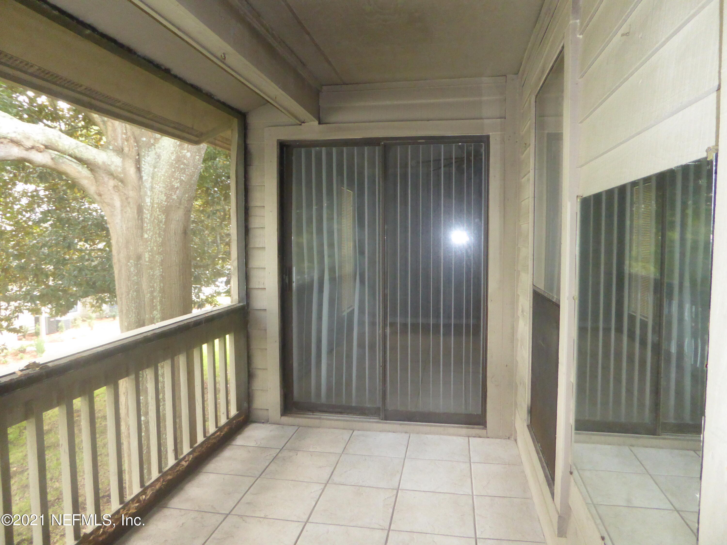 10200 Belle Rive Boulevard, Unit 120 Jacksonville, FL 32256 - Photo 2 of 14 Balcony overlooks water