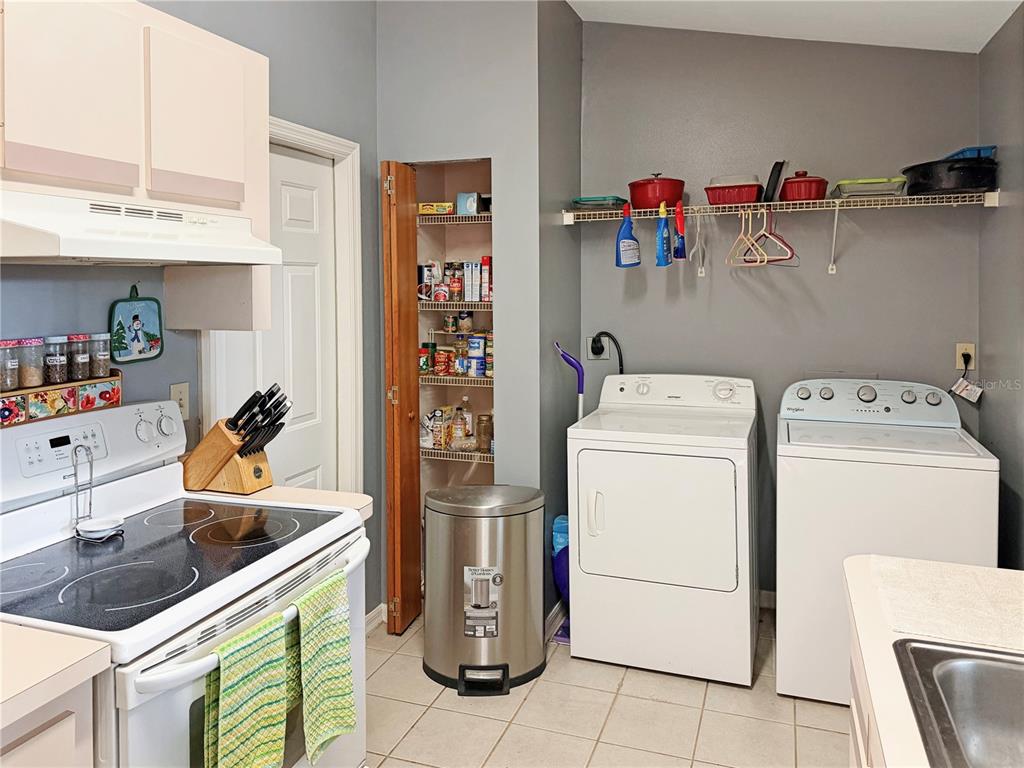 5730 Southeast 41st Street Ocala, FL 34480 - Photo 18 of 27 a utility room with dryer and washer