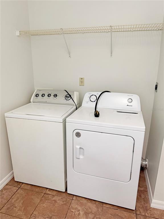 5730 Southeast 41st Street Ocala, FL 34480 - Photo 6 of 27 a utility room with dryer and washer