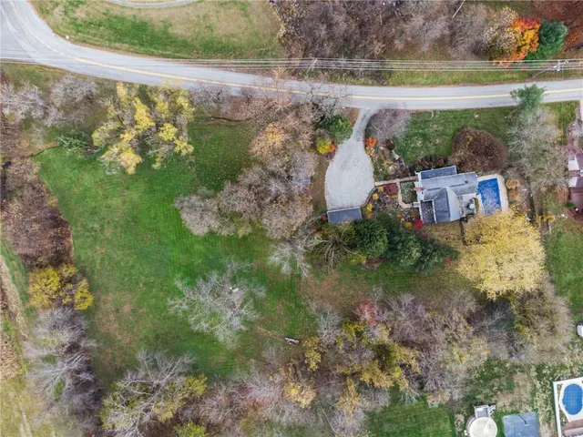 a view of a lake with a building in the background