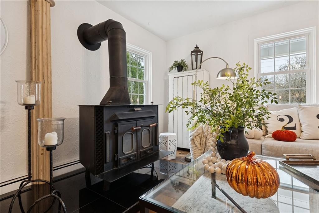 3024 Hyland Road Irwin, PA 15642 - Photo 17 of 45 a living room with furniture and a fireplace