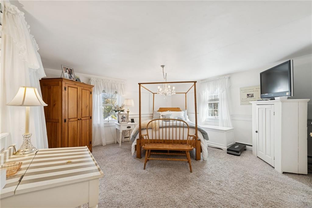 3024 Hyland Road Irwin, PA 15642 - Photo 30 of 45 a bedroom with furniture and a flat screen tv