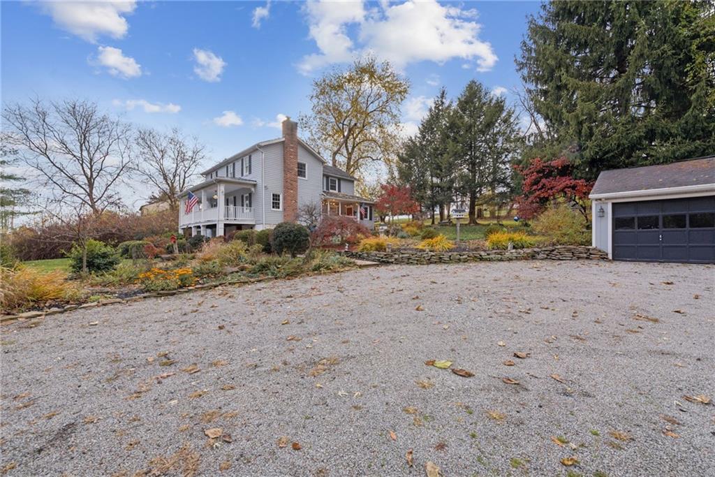 3024 Hyland Road Irwin, PA 15642 - Photo 5 of 45 a view of road with large trees