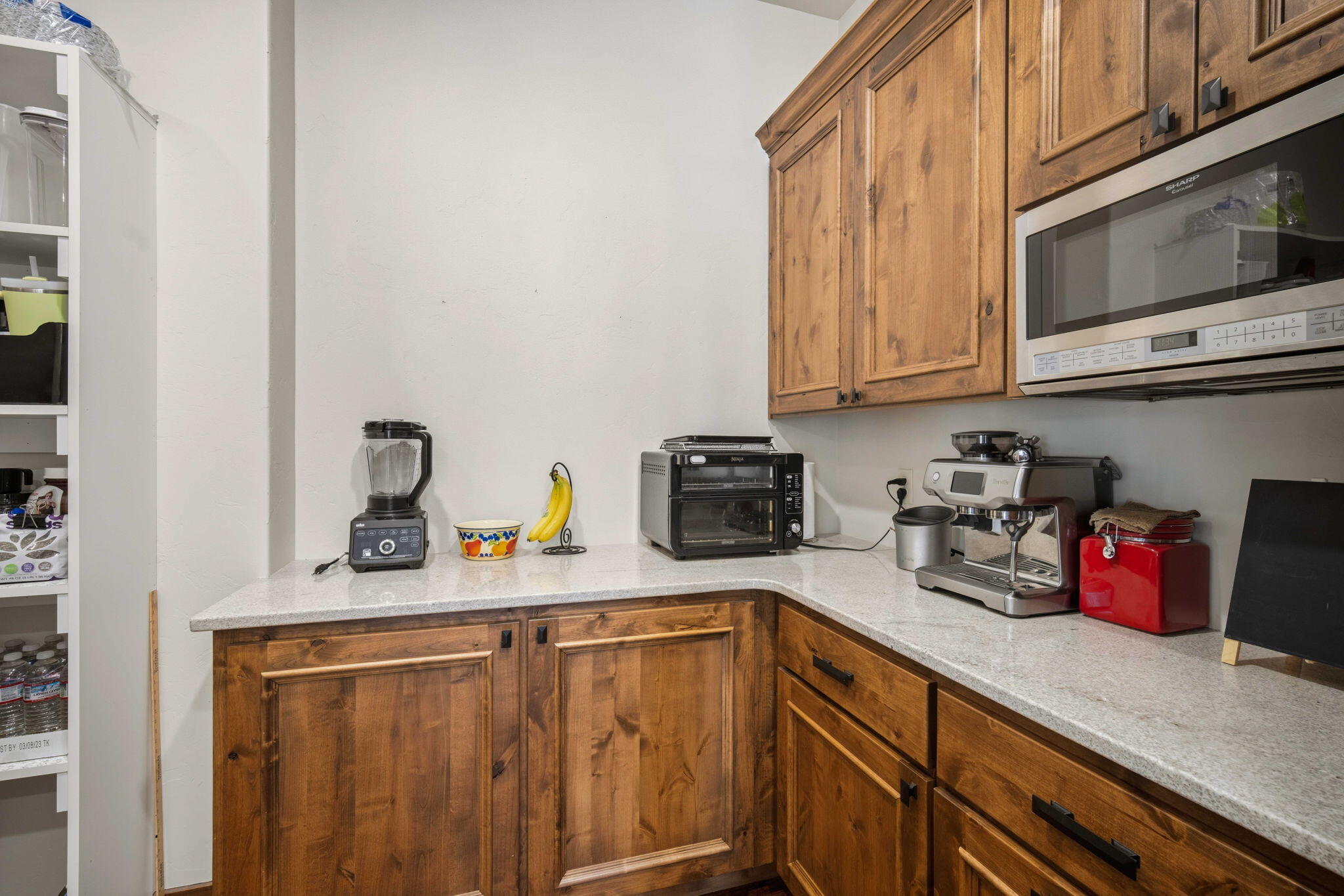 56328 Fireglass Loop Bend, OR 97707 - Photo 17 of 72 Additional kitchen space that leads to a walk in pantry