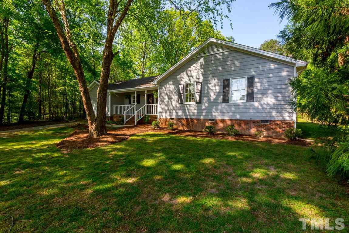 2101 Howson Road Raleigh, NC 27603 - Photo 2 of 25 a front view of house with yard and green space