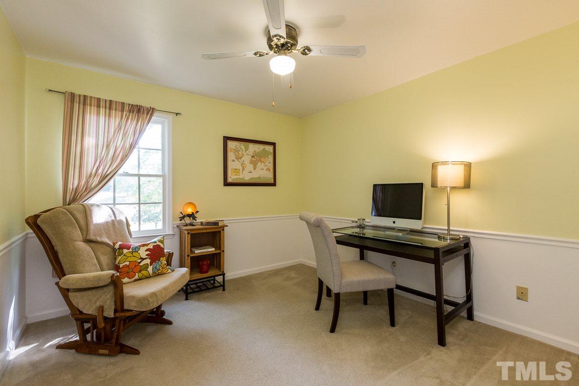 2101 Howson Road Raleigh, NC 27603 - Photo 24 of 25 a view of a workspace with furniture and a window