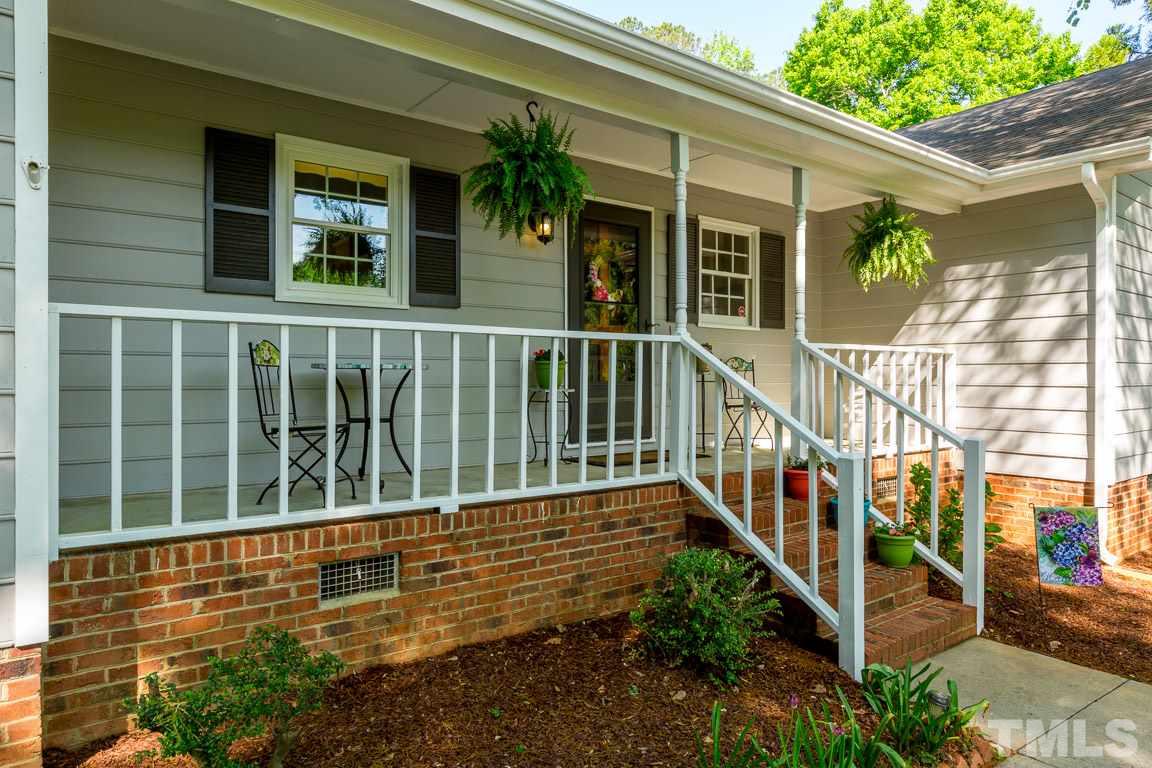2101 Howson Road Raleigh, NC 27603 - Photo 4 of 25 a view of a house with a yard