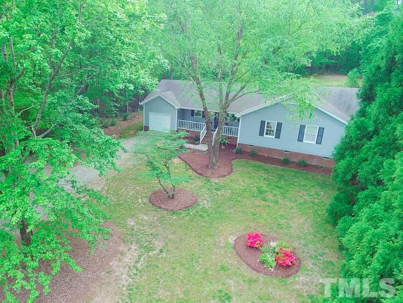 2101 Howson Road Raleigh, NC 27603 - Photo 5 of 25 a front view of a house with yard