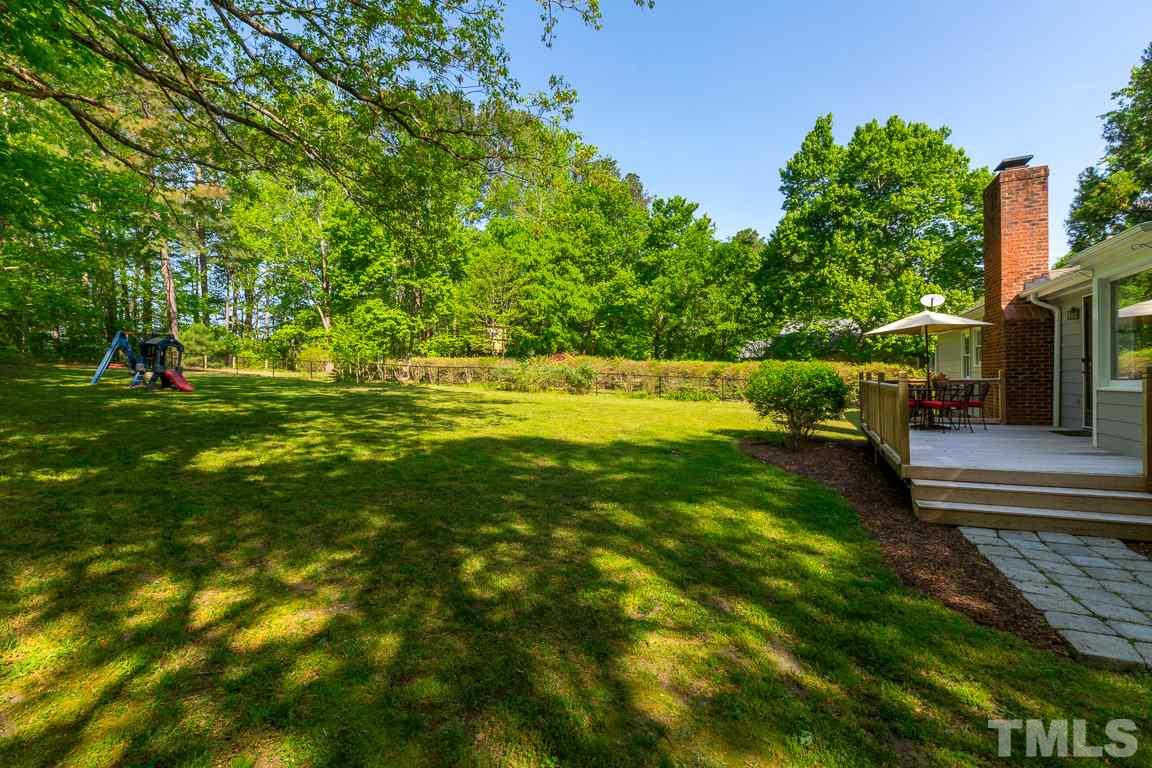 2101 Howson Road Raleigh, NC 27603 - Photo 9 of 25 a view of yard with swimming pool and green space